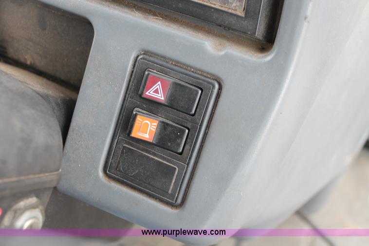 image for item I8025 1999 Ford New Holland TS100 tractor