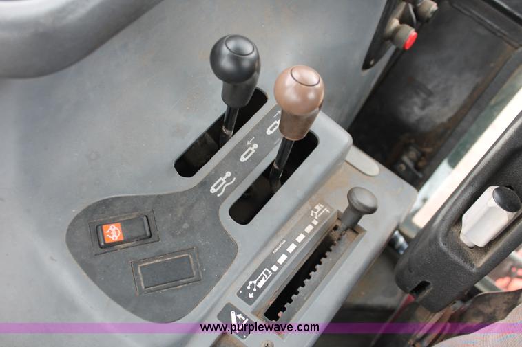 image for item I8025 1999 Ford New Holland TS100 tractor