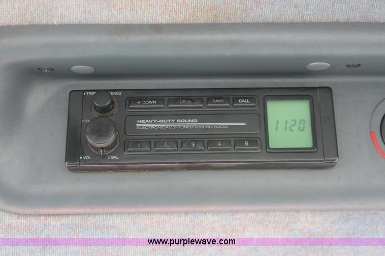 image for item I8025 1999 Ford New Holland TS100 tractor