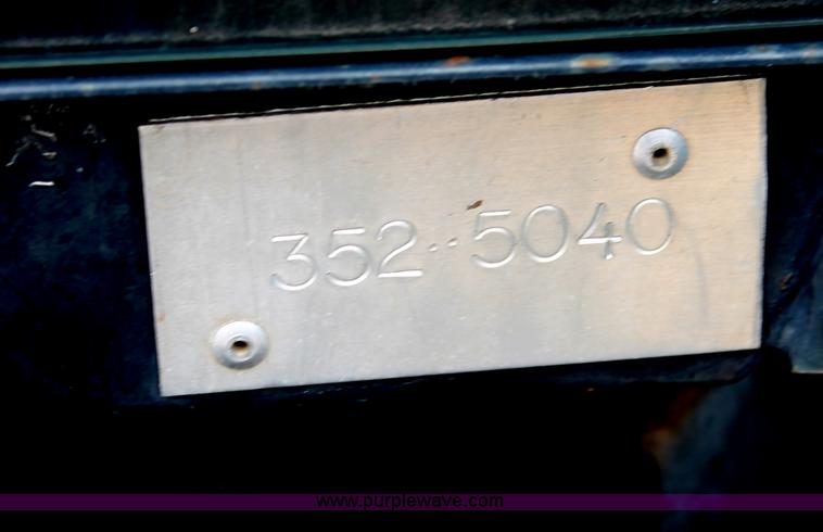 image for item I8025 1999 Ford New Holland TS100 tractor