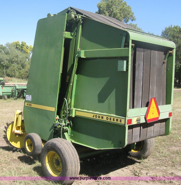 image for item H6300 John Deere 430 round baler