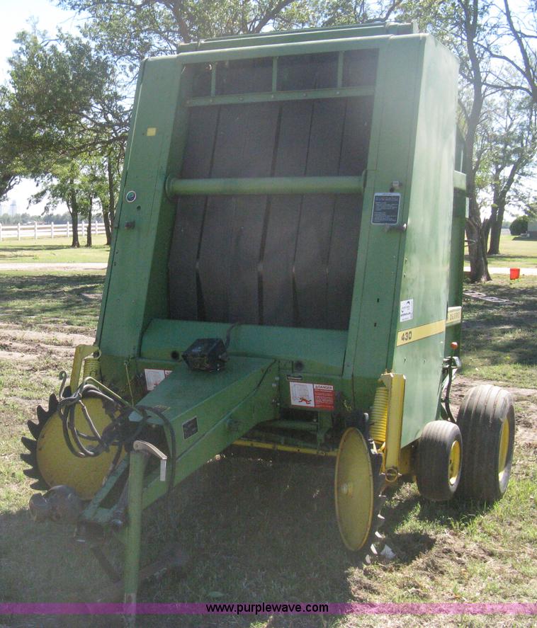 image for item H6300 John Deere 430 round baler