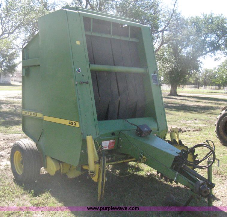 image for item H6300 John Deere 430 round baler
