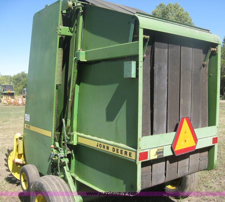image for item H6300 John Deere 430 round baler