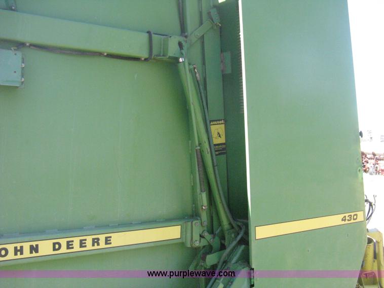 image for item H6300 John Deere 430 round baler