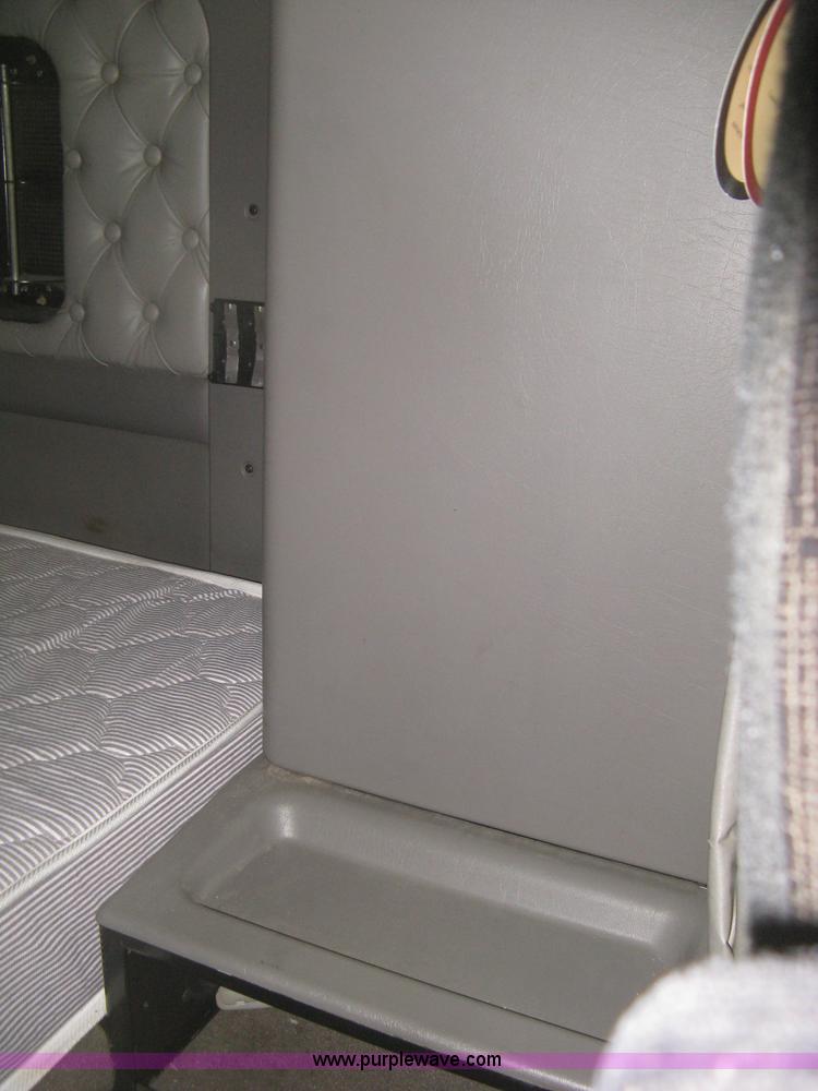 image for item H6311 2006 Kenworth T600B semi truck