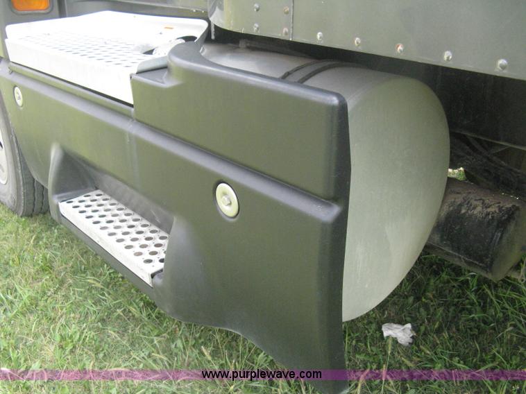 image for item H6311 2006 Kenworth T600B semi truck