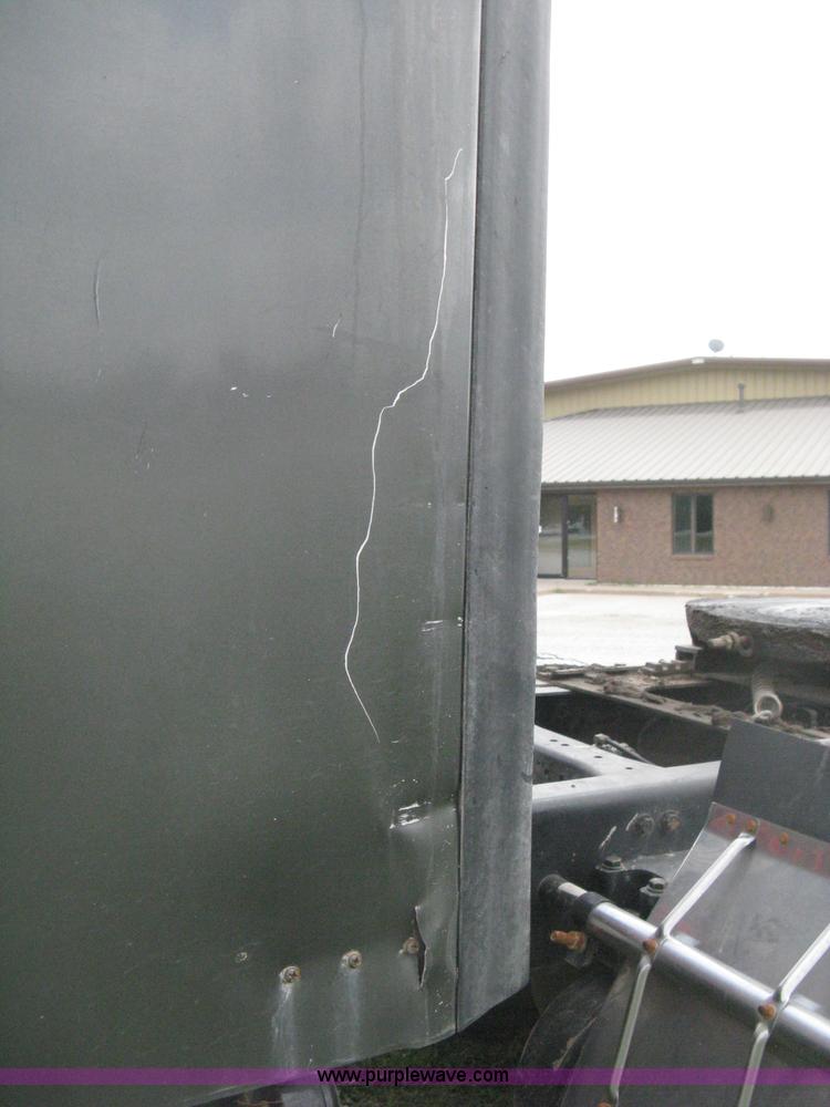 image for item H6311 2006 Kenworth T600B semi truck