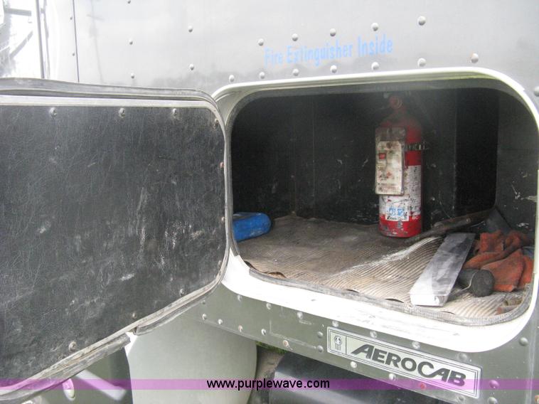 image for item H6311 2006 Kenworth T600B semi truck