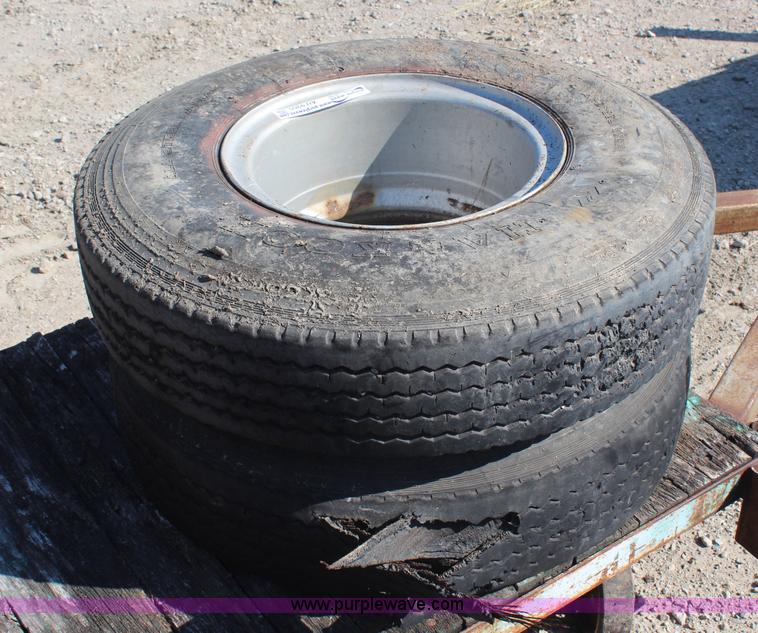 image for item AU9355 (2) 8.25R15 tires and wheels