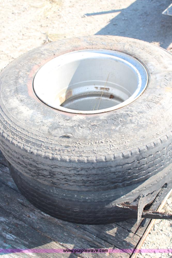 image for item AU9355 (2) 8.25R15 tires and wheels