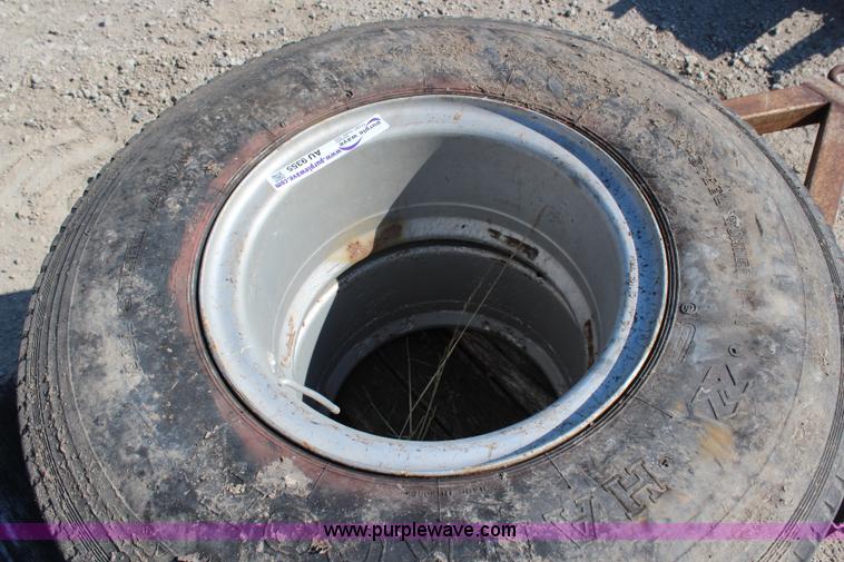 image for item AU9355 (2) 8.25R15 tires and wheels