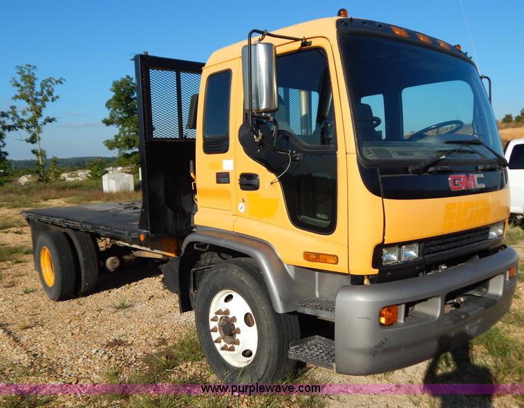 image for item B5876 1998 GMC T7500 flatbed truck