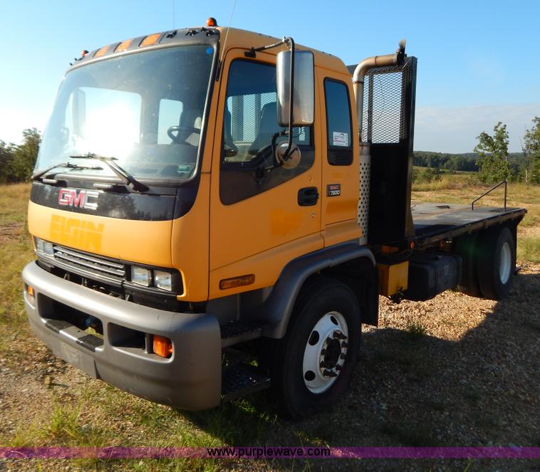 image for item B5876 1998 GMC T7500 flatbed truck