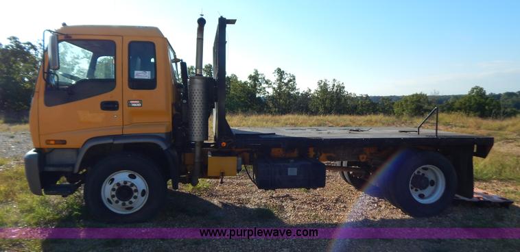 image for item B5876 1998 GMC T7500 flatbed truck