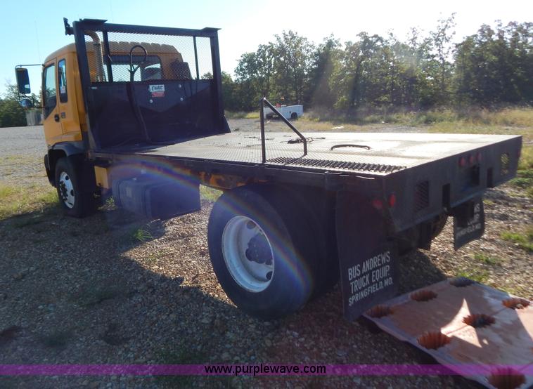 image for item B5876 1998 GMC T7500 flatbed truck