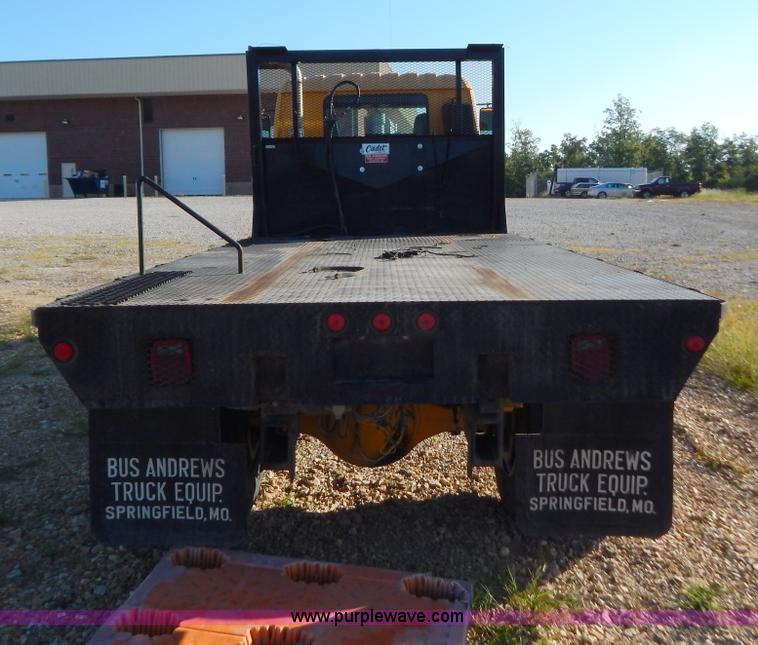 image for item B5876 1998 GMC T7500 flatbed truck