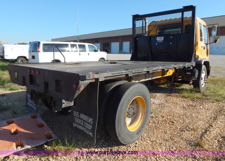 image for item B5876 1998 GMC T7500 flatbed truck