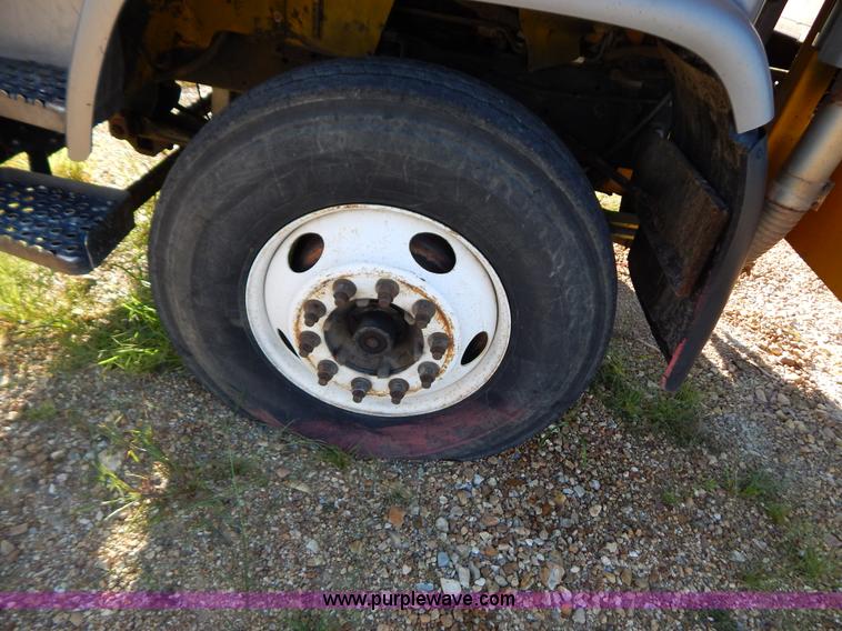 image for item B5876 1998 GMC T7500 flatbed truck