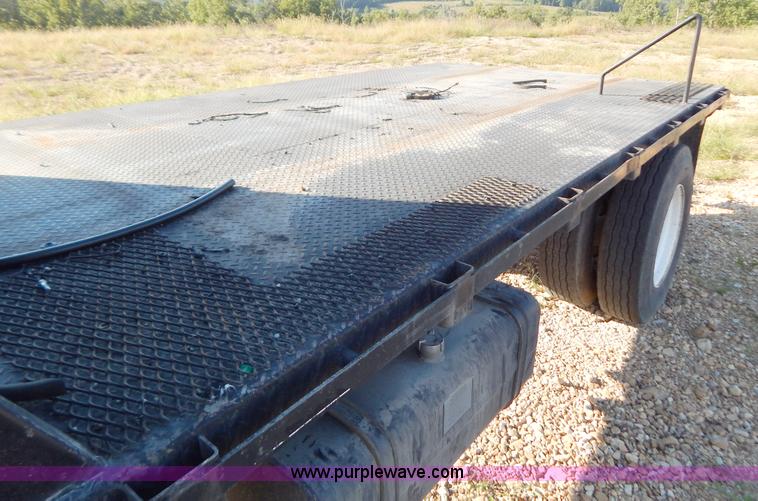 image for item B5876 1998 GMC T7500 flatbed truck