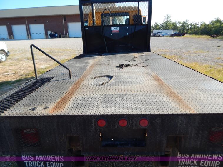 image for item B5876 1998 GMC T7500 flatbed truck
