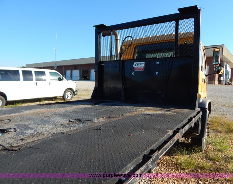 image for item B5876 1998 GMC T7500 flatbed truck