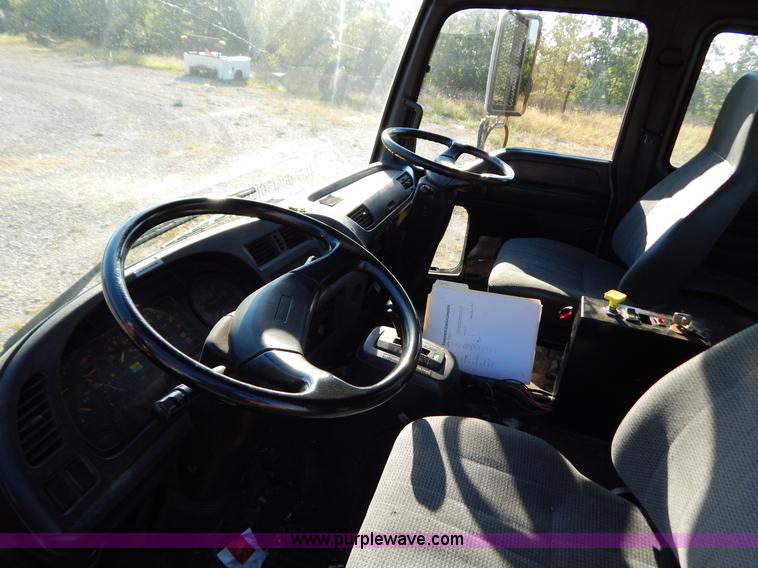 image for item B5876 1998 GMC T7500 flatbed truck