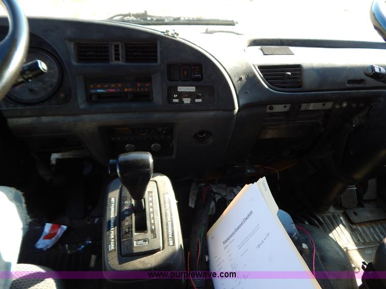 image for item B5876 1998 GMC T7500 flatbed truck