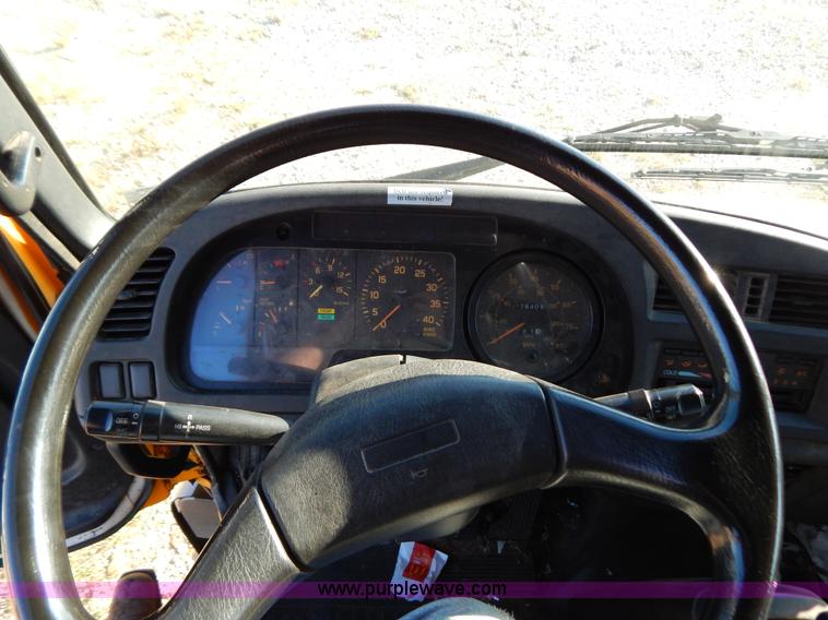 image for item B5876 1998 GMC T7500 flatbed truck