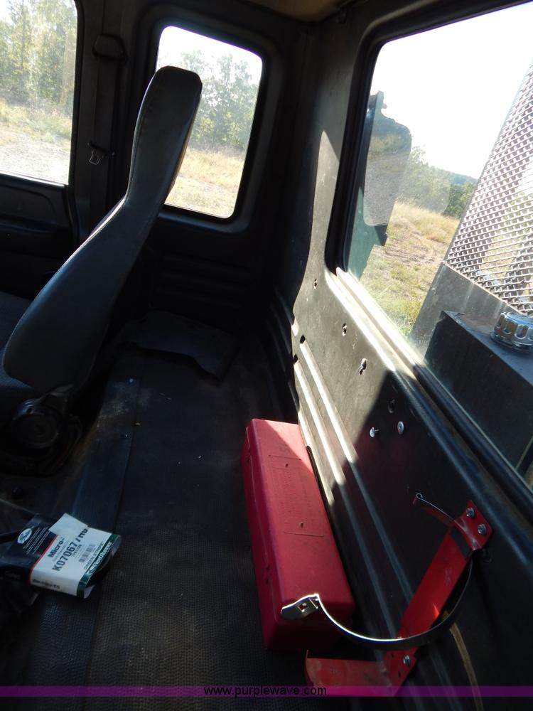 image for item B5876 1998 GMC T7500 flatbed truck