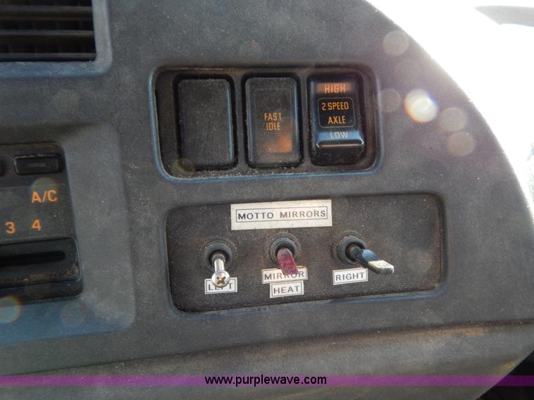 image for item B5876 1998 GMC T7500 flatbed truck