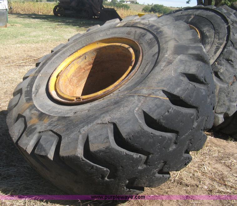 (4) Caterpillar 980 loader tires and wheels in Mt. Hope, KS Item