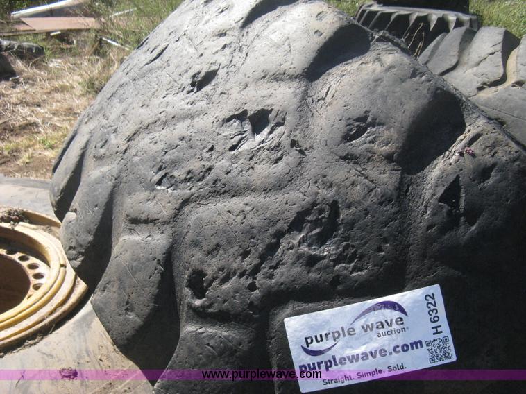 image for item H6322 (4) Caterpillar 980 loader tires and wheels
