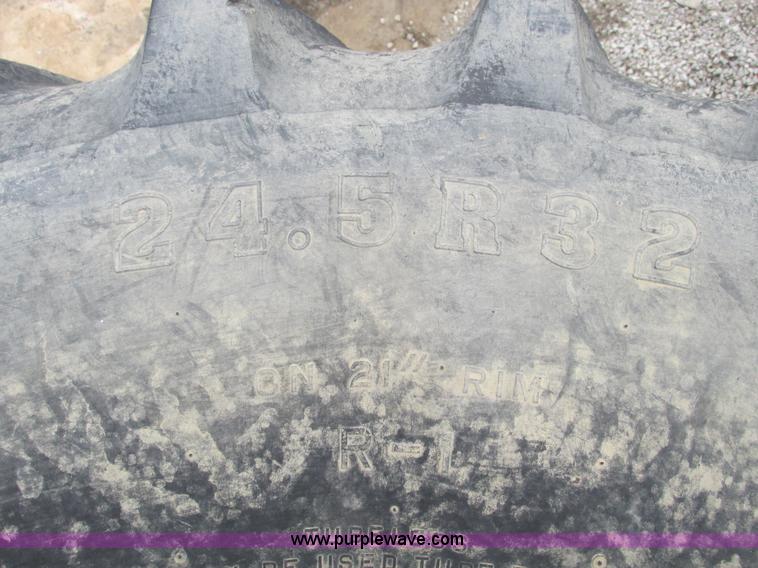 image for item AK9823 (3) Firestone 24.5R32 tires and wheels