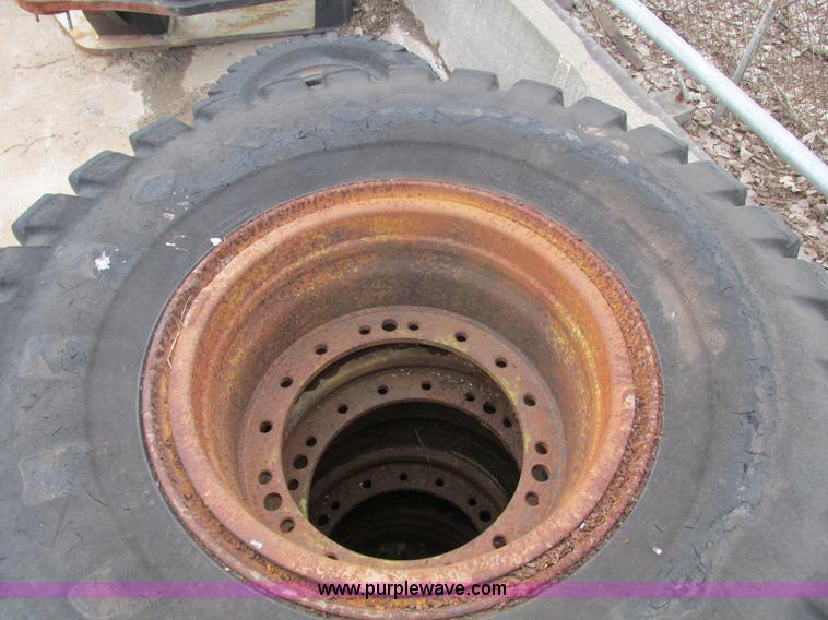 image for item AK9826 (4) 16-25 tires and wheels