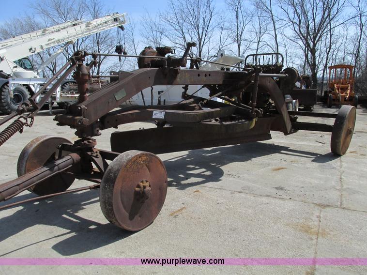 image for item B5800 Caterpillar 66 pull behind grader
