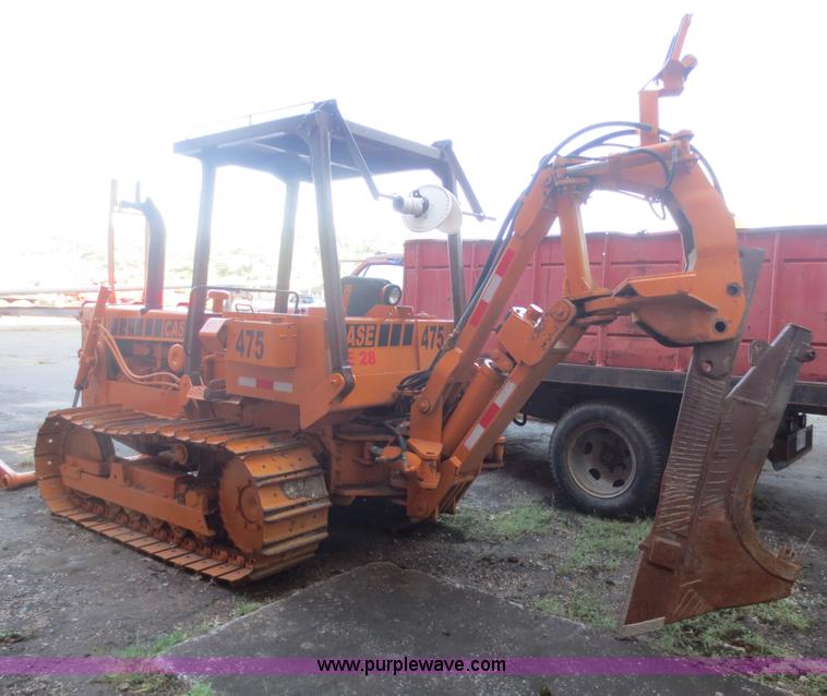 image for item D5914 1976 Case 475 track cable plow