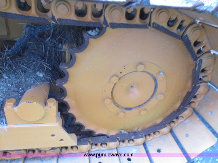 image for item D5914 1976 Case 475 track cable plow