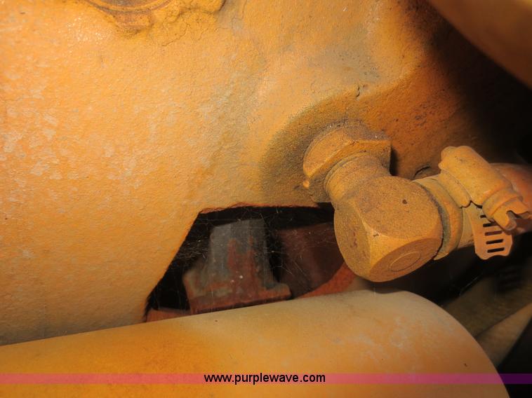 image for item D5914 1976 Case 475 track cable plow