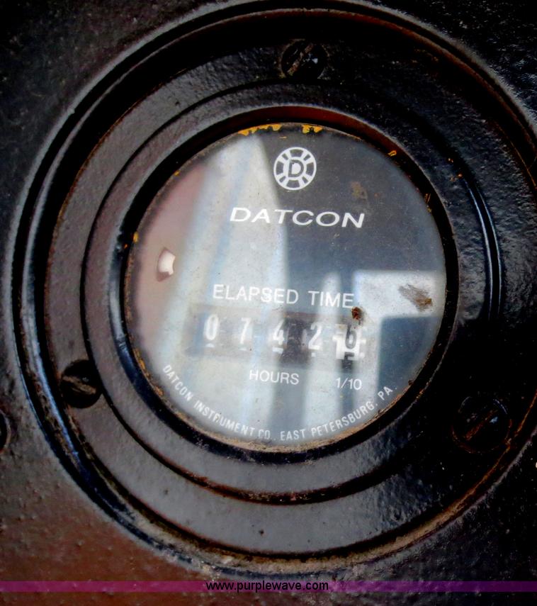 image for item D5914 1976 Case 475 track cable plow