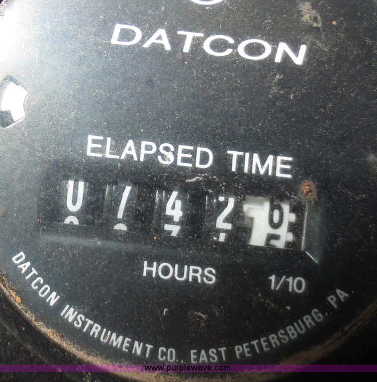 image for item D5914 1976 Case 475 track cable plow