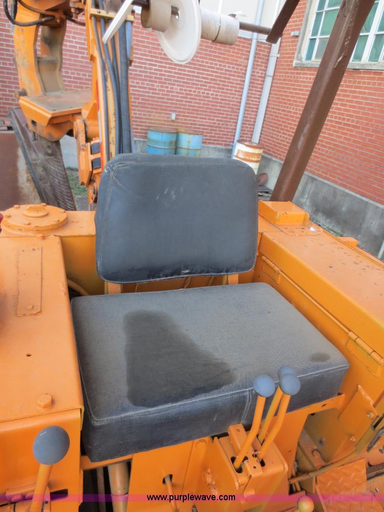 image for item D5914 1976 Case 475 track cable plow