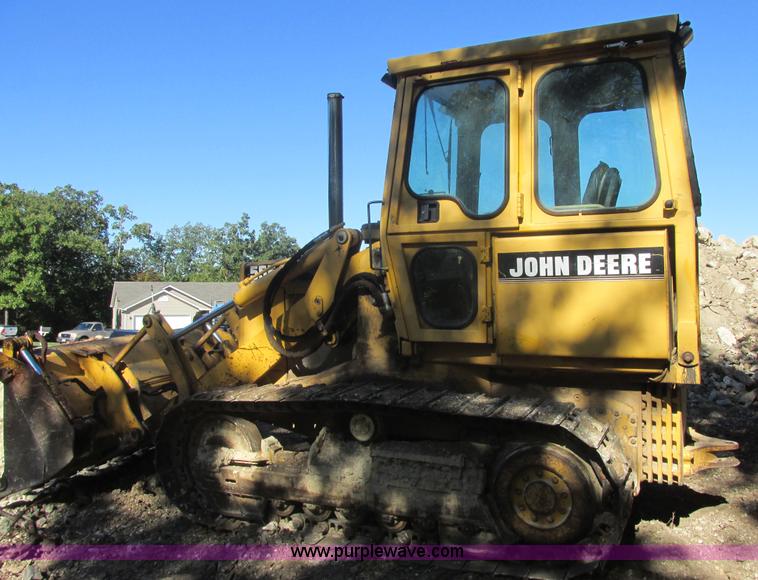 image for item E7404 John Deere 555G Series IV track loader