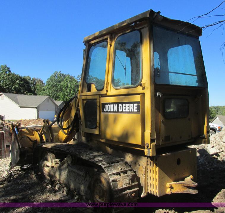 image for item E7404 John Deere 555G Series IV track loader