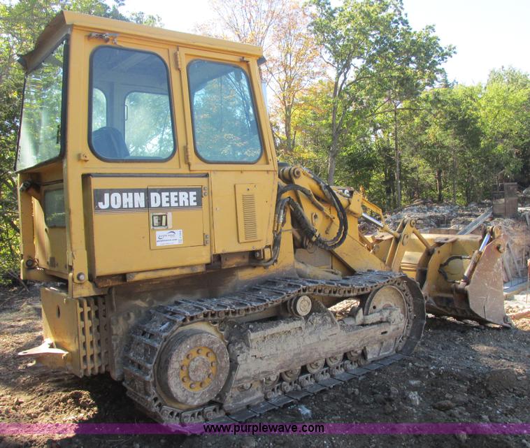 image for item E7404 John Deere 555G Series IV track loader