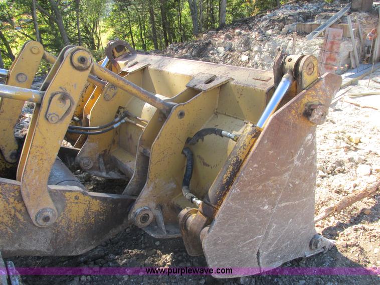 image for item E7404 John Deere 555G Series IV track loader