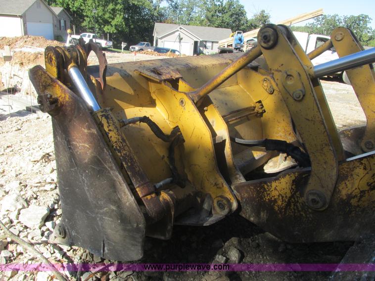 image for item E7404 John Deere 555G Series IV track loader