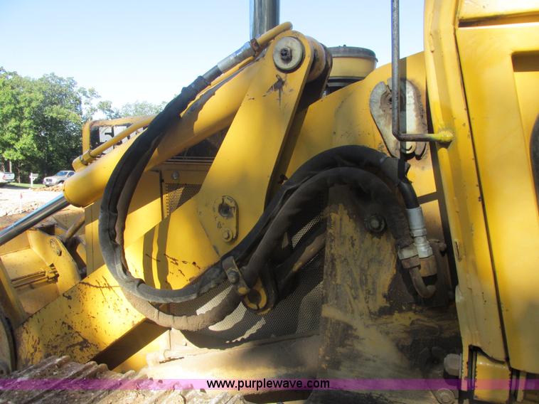 image for item E7404 John Deere 555G Series IV track loader