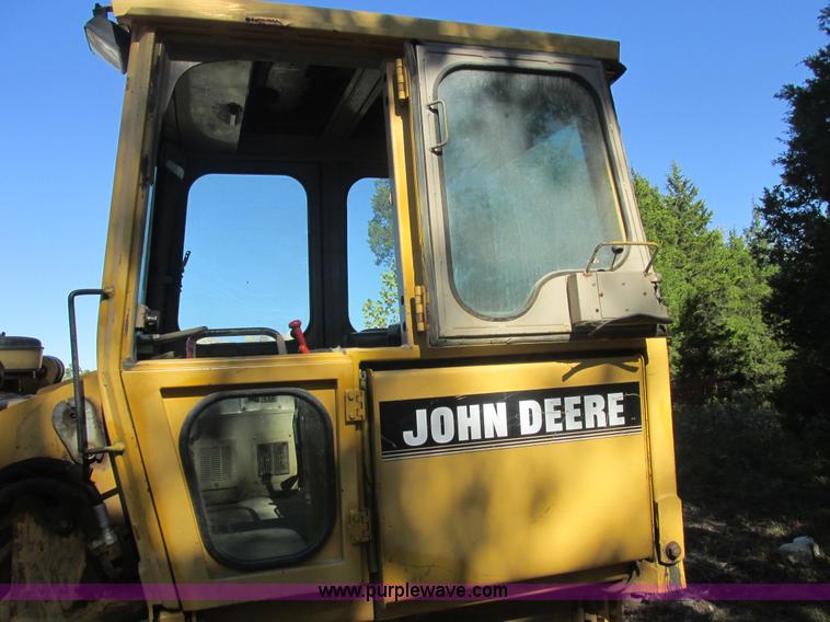 image for item E7404 John Deere 555G Series IV track loader