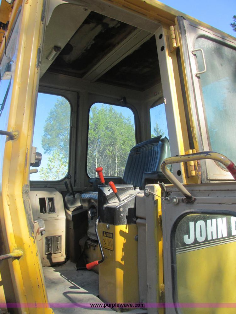image for item E7404 John Deere 555G Series IV track loader